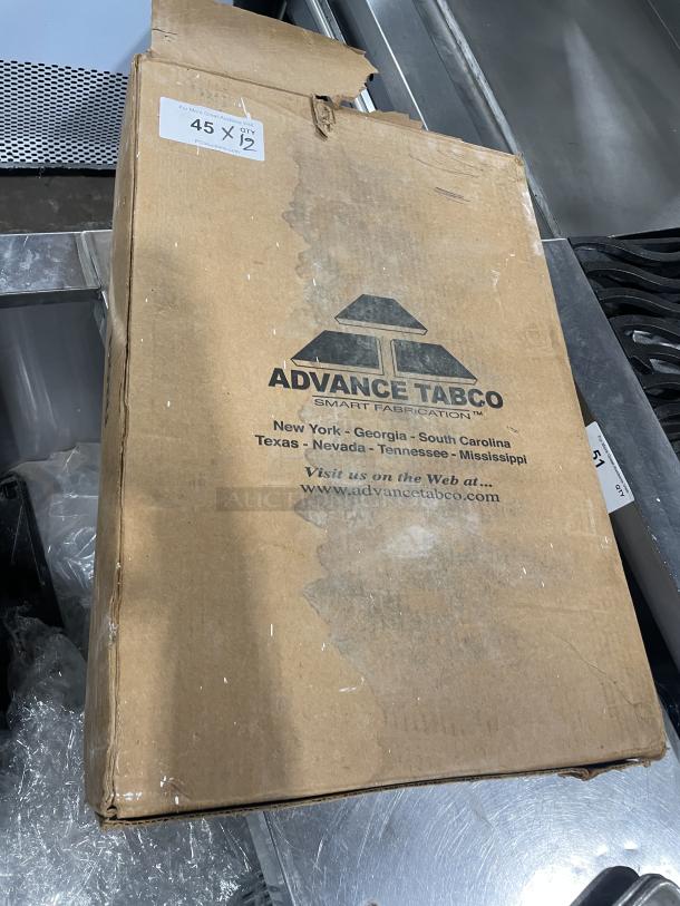 Brand new Advance Tabco full-size baking sheet pans in cardboard box, 12 pieces per bid. Box shows "45 X" and "QTY 2".