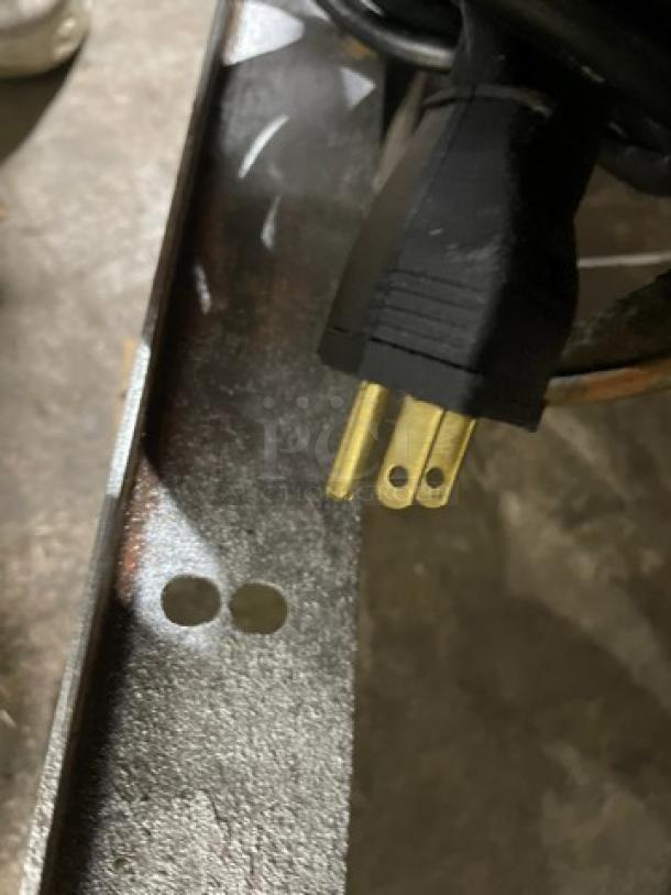 Beverage Air SW7230M refrigerated sandwich prep table power cord, 115V, shown on casters. Model visible on plug tag.