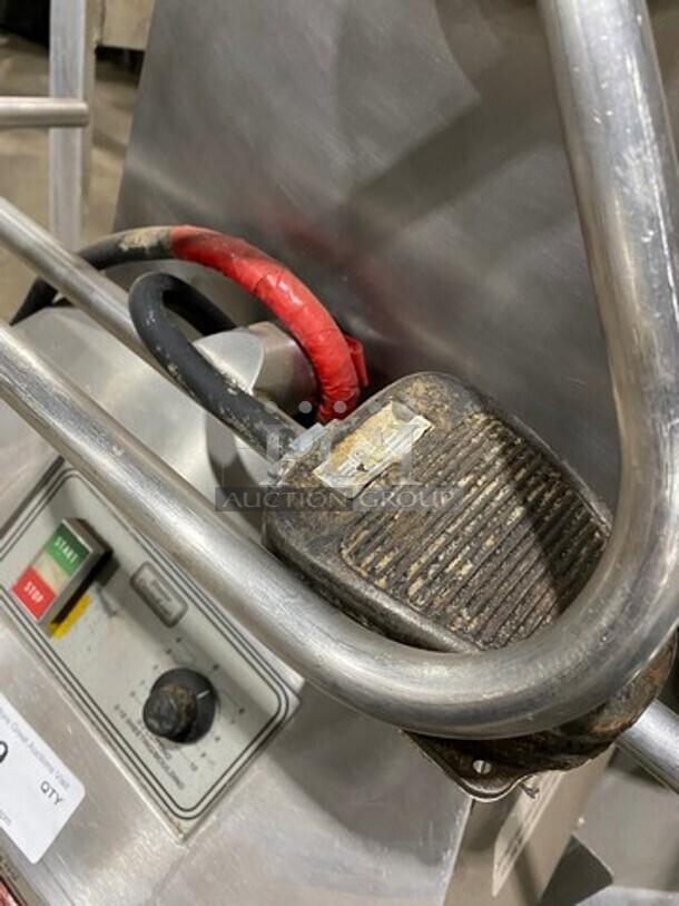 Moline heavy-duty commercial reversible dough sheeter with foot pedal, stainless steel construction, and control panel with start/stop buttons.