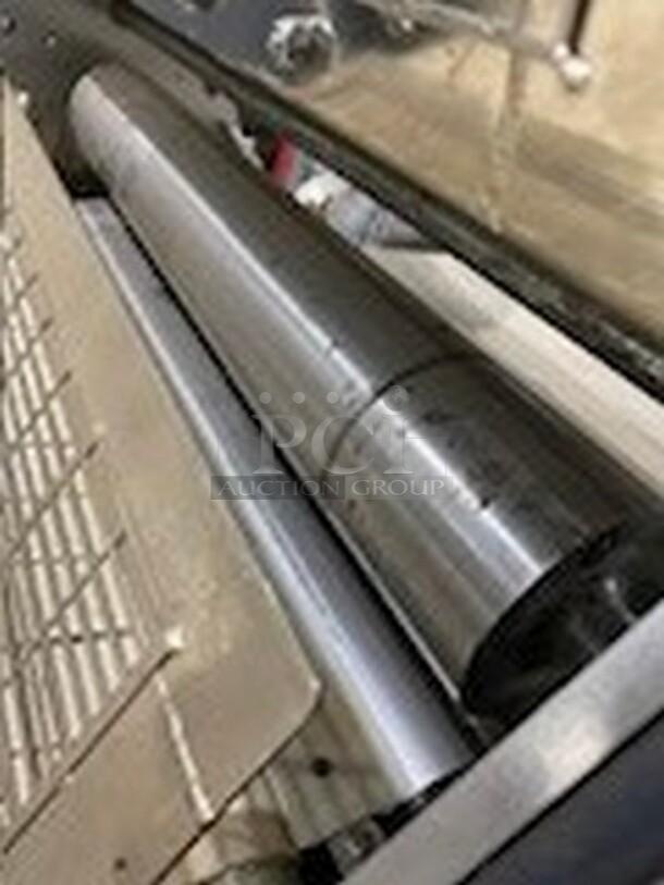 Moline commercial reversible dough sheeter, floor style, heavy duty with foot pedal, 3-phase, used condition.