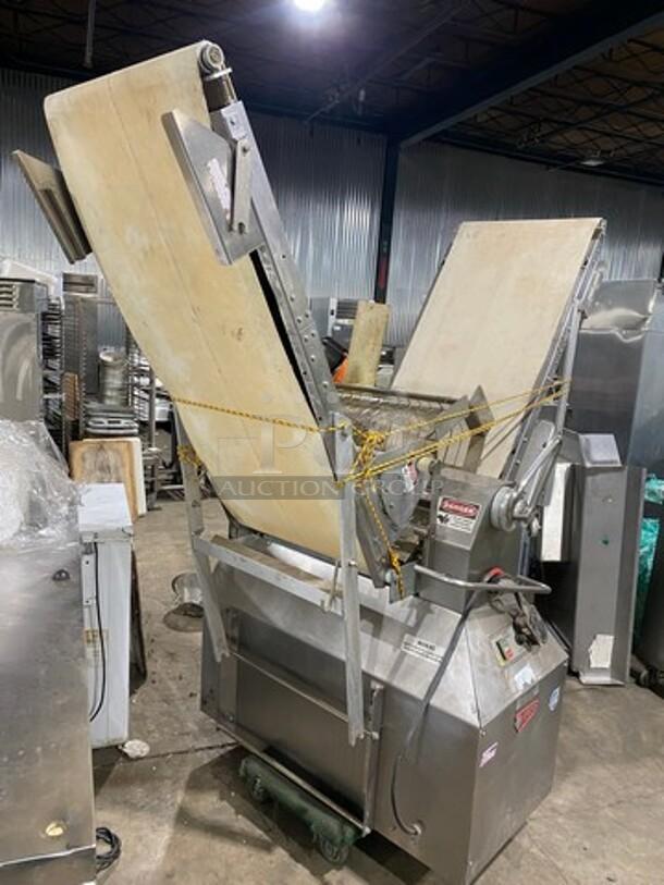 Moline heavy-duty commercial reversible dough sheeter, features foot pedal and 3-phase power, stainless steel, used condition.