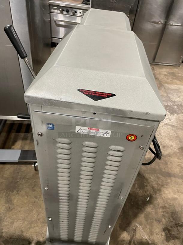 Univex SRM60+ 60 Qt planetary mixer, stainless steel bowl, wire whisk, 208-240V, on legs, working condition, SN: M0904018.