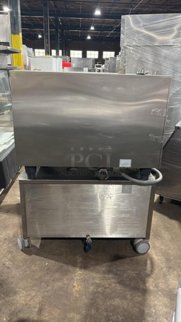 Rational SCCWE62G combi convection oven, natural gas, 208V, on mobile cart with built-in pan rack. Mint condition.