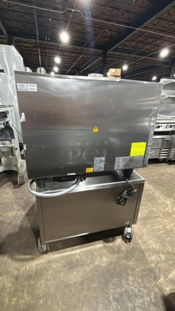 Rational SCCWE62G natural gas combi oven on mobile cart with built-in pan rack, stainless steel, model SW62G, serial G62SH1403239468.
