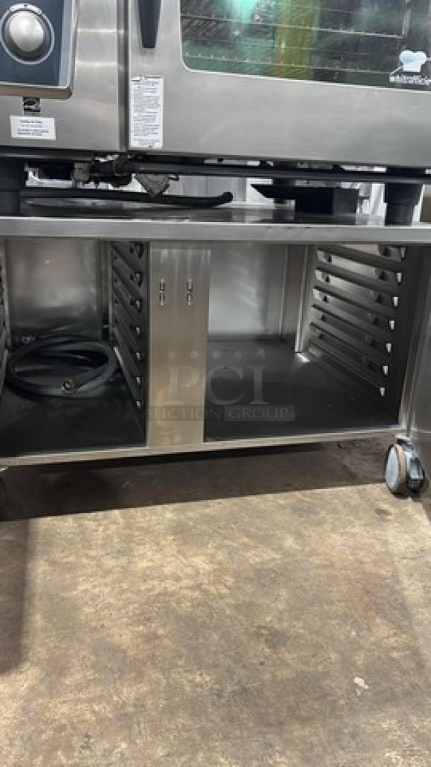 Rational Whit Efficiency Series natural gas convection oven, model SCCWE62G, on cart with pan rack and casters; serial G62SH1403239468.