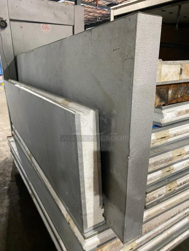 Mr. Winter 10'x10' walk-in cooler box. Includes compressor and blower. Panels shown, professionally removed, good condition.