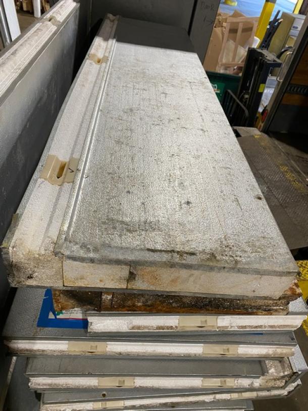 Mr. Winter 10' x 10' walk-in cooler panels, stacked, with visible wear. Includes compressor and blower, professionally removed.