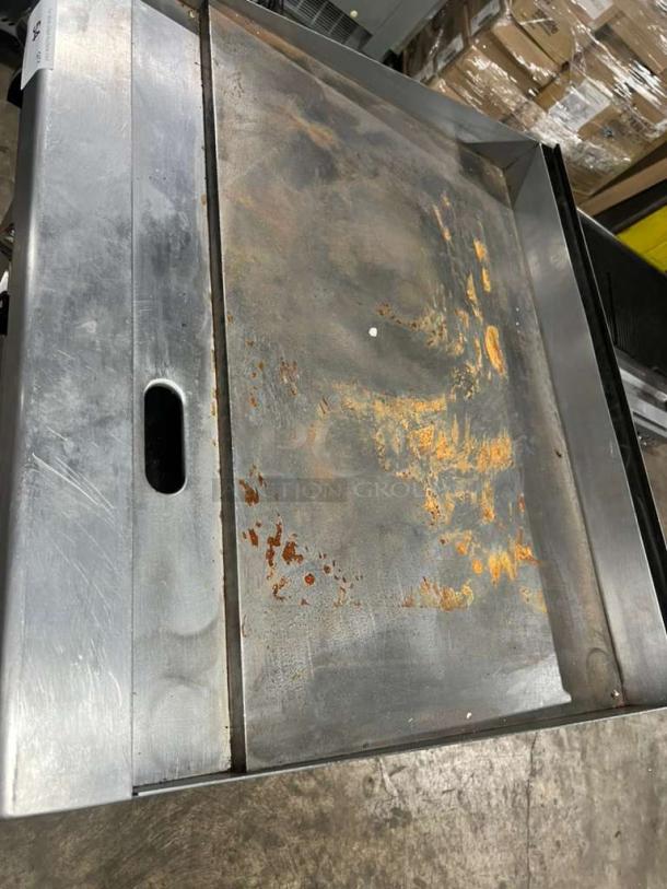 Garland GTGG36 commercial gas griddle, thermostatic controls, visible rust and wear, on legs, serial 1709100101226.