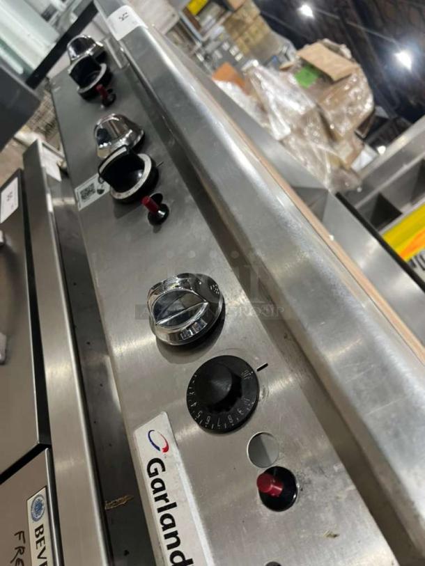 Garland GTGG36 heavy-duty commercial gas griddle with thermostatic controls, model GTGG36, serial 1709100101226.