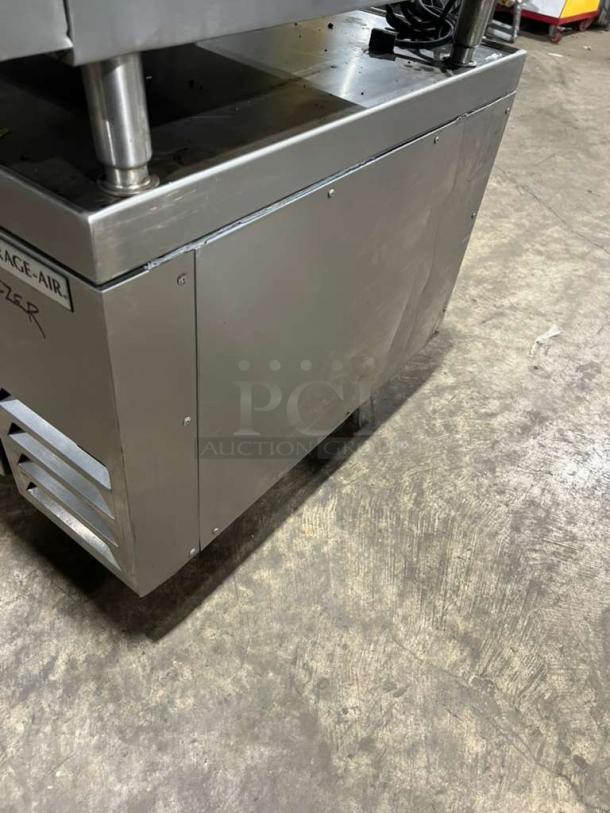 Garland GTGG36 gas-powered flat griddle with thermostatic controls, heavy-duty, stainless steel, on legs, commercial use.