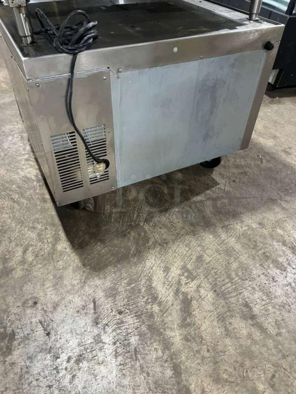 Beverage Air 36-inch 2-drawer freezer chef base, model WTFCS36D-1, with serial 13308083 on casters, used condition.