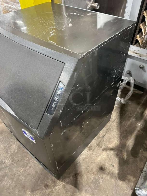 Manitowoc under counter ice maker, model UYGF0140A-161B, 115V, visible wear, serial 310473363.