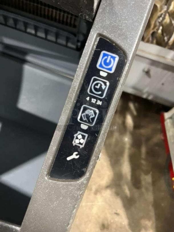 Manitowoc under counter ice maker, model UYGF0140A-161B, control panel with power and operation icons visible.