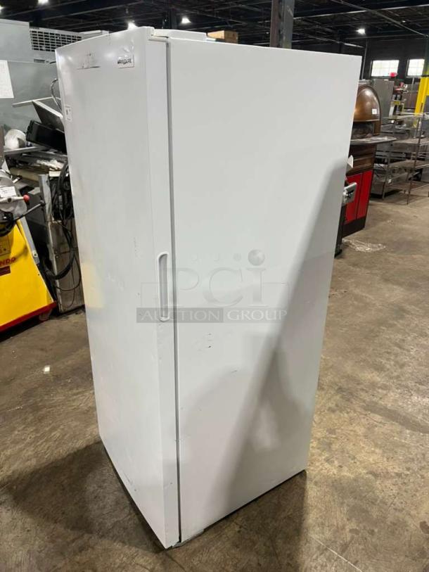Frigidaire upright freezer, model FFFU16F2VW, in white. Free-standing, 115V, 1 phase, showing minor wear.