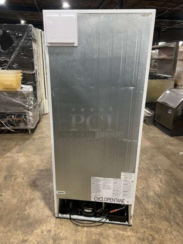 Frigidaire upright freezer, model FFFU16F2VW. Serial 8A24905993. Free-standing, 115V, 1 phase. Cyclopentane label visible.