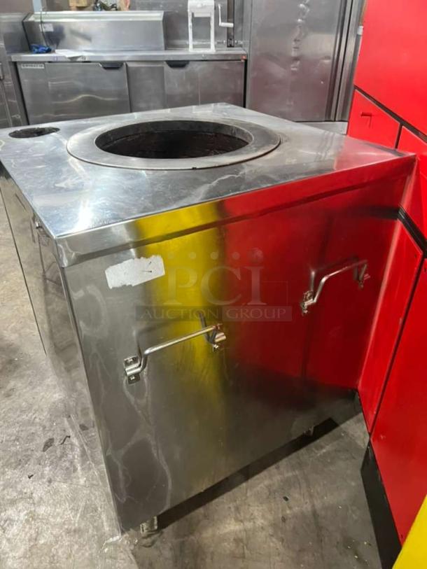 AMCO all stainless steel gas-powered tandoori oven, Indian style, in good condition with visible wear; square design with round opening.