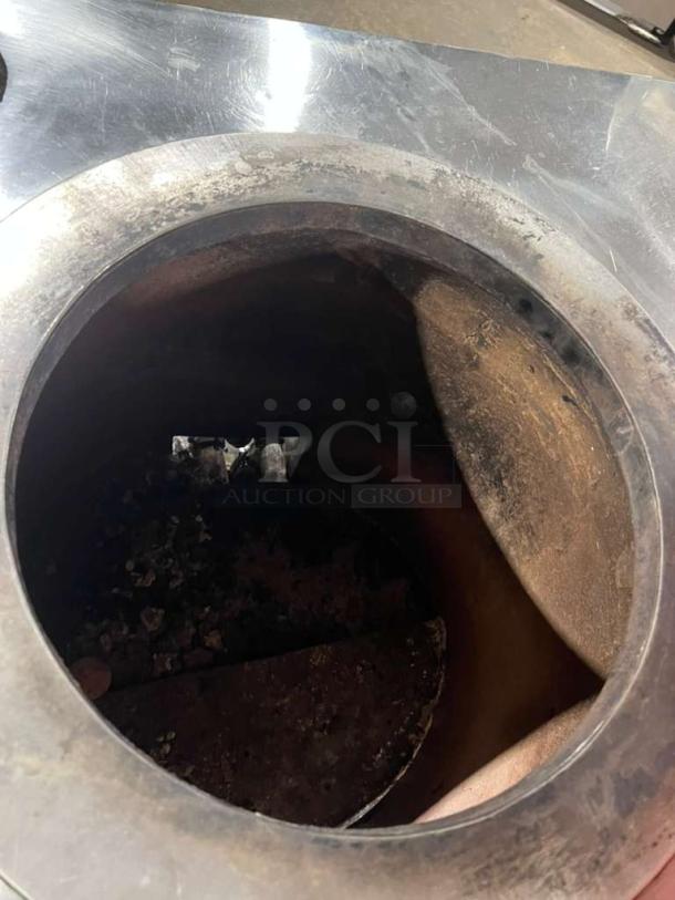 AMCO stainless steel gas-powered tandoori clay oven, used condition. Indian style, sturdy design, circular opening.