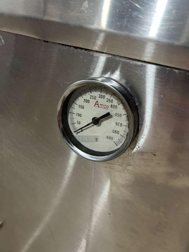 Stainless steel Amco gas-powered tandoori oven with temperature gauge reading 0-600°C, Indian style.