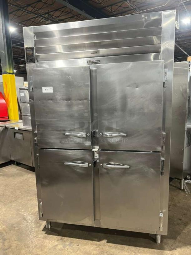 Traulsen AHT2-32 reach-in refrigerator with 4 split doors, built-in pan racks, and mounted on legs. Model 227791, 115V, 1 phase.