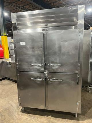 Traulsen AHT2-32 reach-in refrigerator with 4 split doors, built-in pan racks, and mounted on legs. Model 227791, 115V, 1 phase.