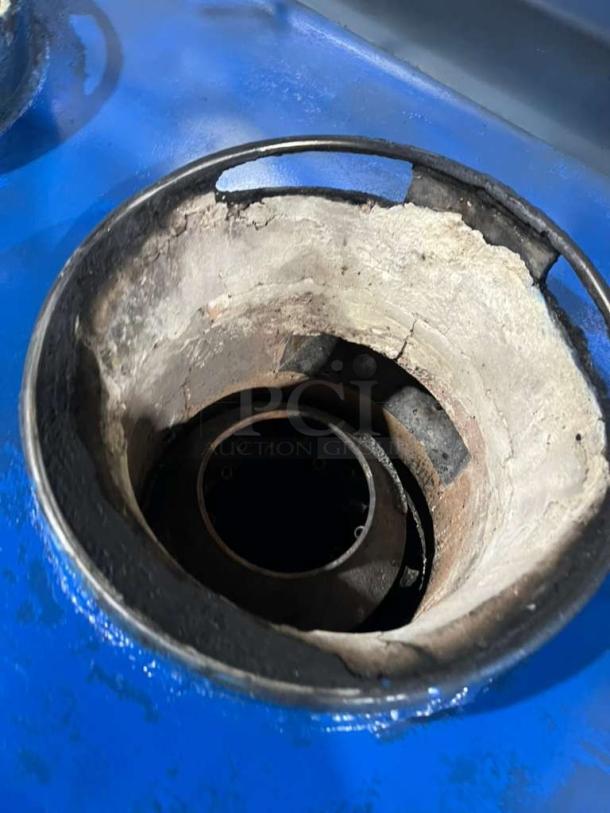 All stainless steel dual wok gas range, like new condition, high BTU output, built-in faucets, on sturdy legs.