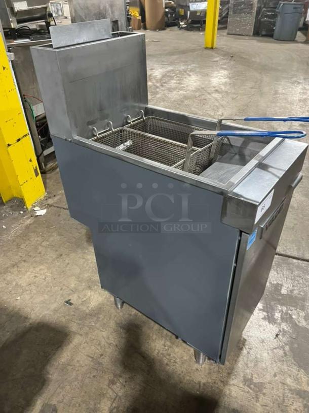Vulcan stainless steel deep fryer, model 1VEG35M-1, with two baskets, on legs, in good condition.