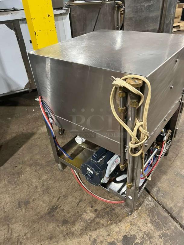 ADS under counter commercial dishwasher, stainless steel, Model ET-AF-M, serial 25857, 120V 1 Phase, visible wiring and components.