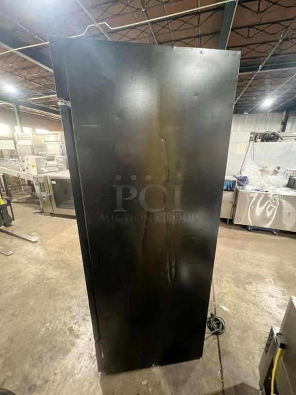 Habco ESM28 one-door reach-in cooler, black finish, model and serial info on listing, 115V 1 Phase, good condition.