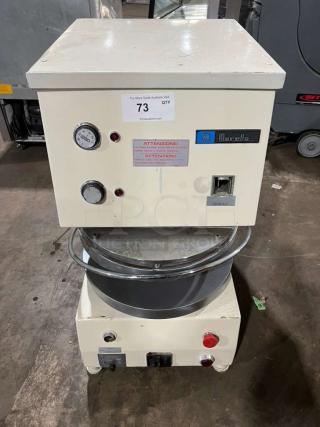 Morello electric dough press machine with control dials and warning labels. Appears in used condition.