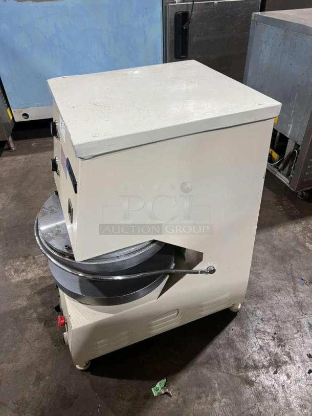 Morella electric dough press machine, metal and white finish, sturdy build, used condition, ideal for high-volume kitchens.