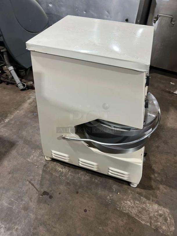 Morello electric dough press machine, white, metal construction, appears in good condition. Ideal for high-volume dough pressing.