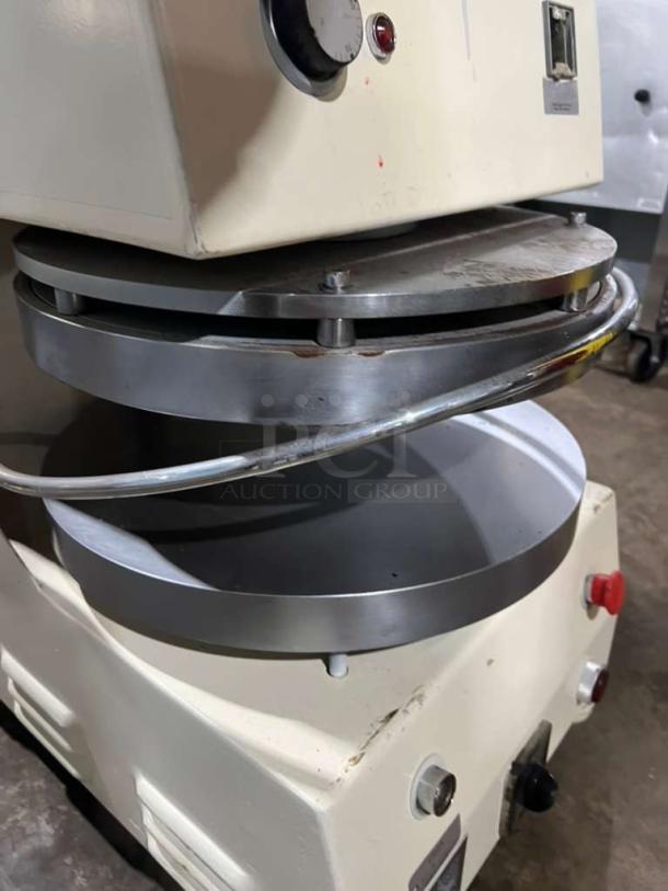 Morella electric dough press machine, metal plates, control dial, off-white housing, used condition, visible wear marks.