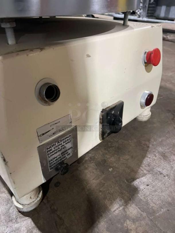 Morella electric dough press machine, beige casing, visible control knobs, and operational warning label. Good condition.