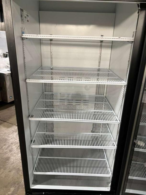 Habco ESM28 single door cooler merchandiser with adjustable shelves, Model ESM28, Serial 280520894, 115V, 1 Phase.
