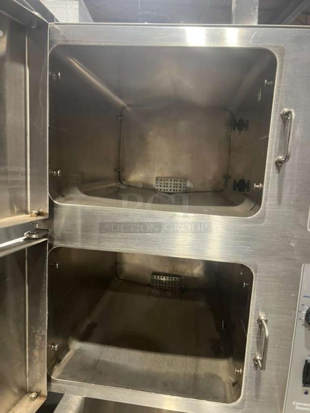 Cleveland Range model 24CEM24 dual compartment stainless steel convection steamer, electric, 202/220V 3-phase, excellent condition.