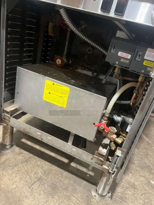 Cleveland Range Model 24CEM24 dual compartment convection steamer. All stainless steel. Serial 1009230000157. 202/220V, 3 Phase.