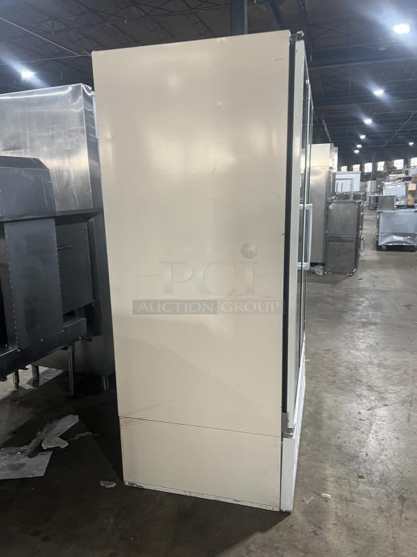 Master-Bilt BLG48HD commercial freezer, white, two glass doors, poly-coated wire rack, 115V, 1 phase. Model SN: 022414.