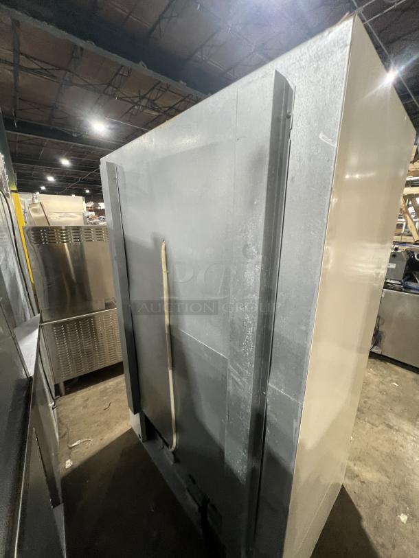 Master-Bilt BLG48HD commercial freezer, two glass doors, white, poly-coated racks, 115V, model SN: 022414, used condition.