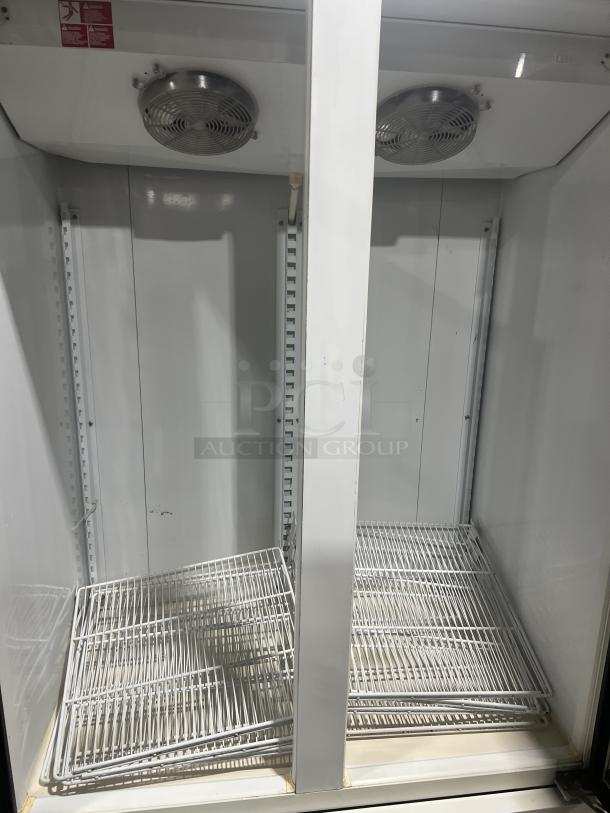 Master-Bilt BLG-48HD commercial freezer with 2 glass doors, poly coated wired racks, model label visible.