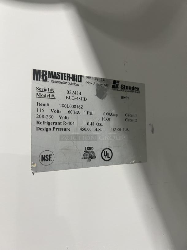 Master-Bilt BLG48HD commercial freezer, 2-glass doors, poly-coated rack, model/serial label showing specs and UL, NSF listings.