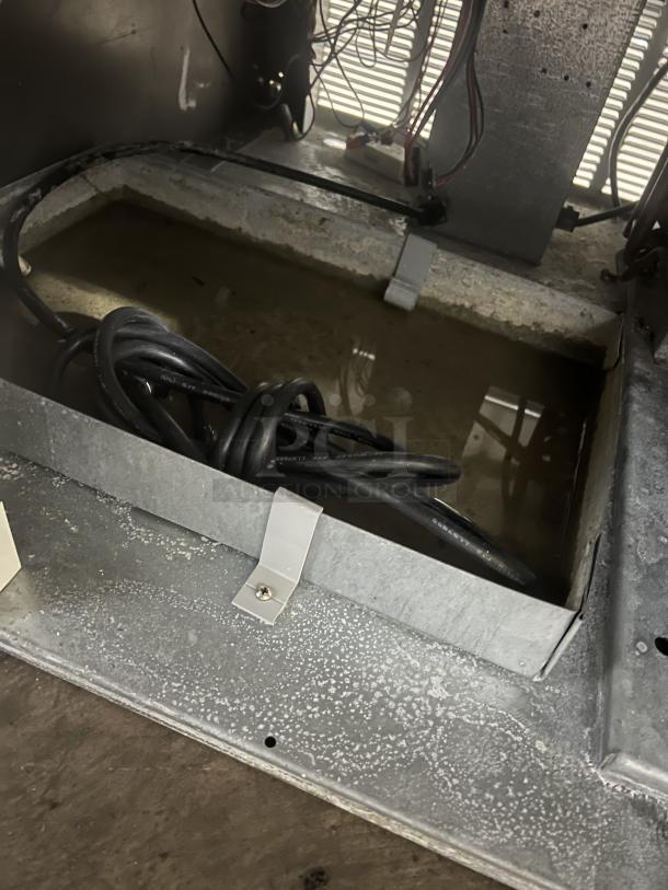 Master-Bilt Commercial BLG48HD freezer wiring and interior components, showing steel frame and electrical connections.