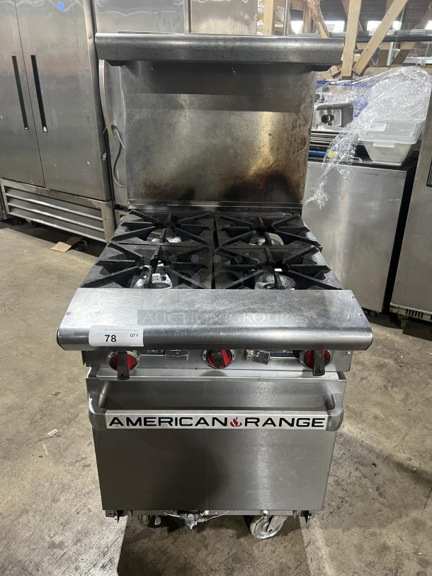 American Range commercial stainless steel gas 4-burner range/oven combo with backsplash, overhead salamander shelf, and wired oven rack.