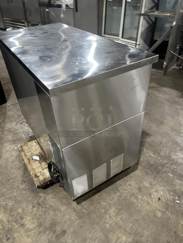 True commercial stainless steel 2-door back bar cooler, model TBB-24-48S, 115V, with black coated wired rack, excellent condition.
