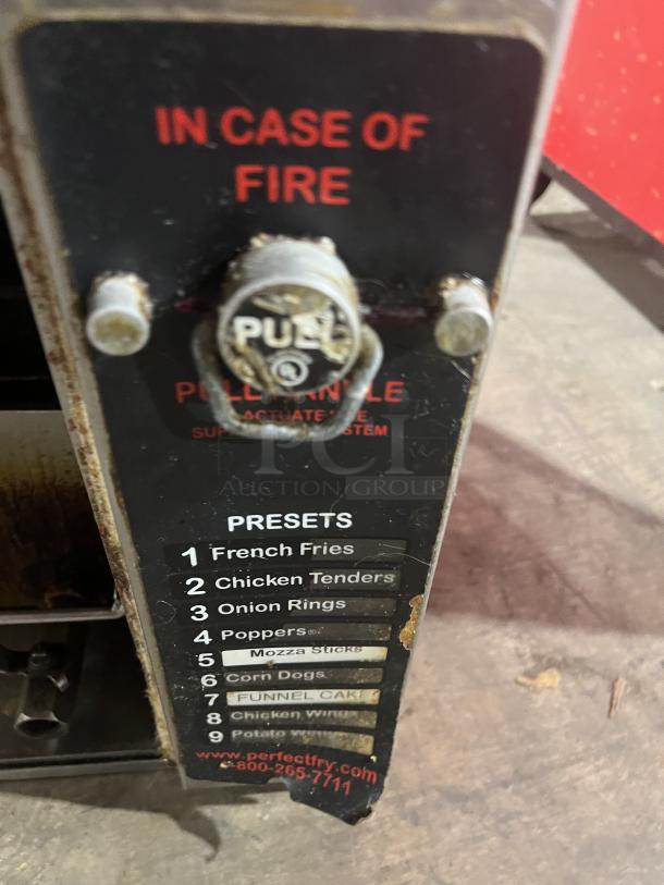 Perfect Fry PFC570 stainless steel fryer with fire safety pull lever, preset cooking options, visible wear. 240V, 1 Phase.