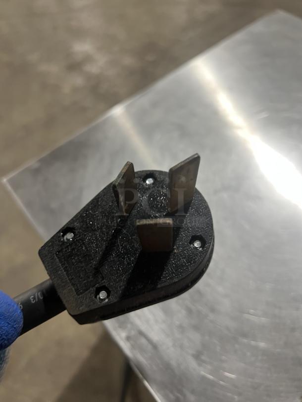 Close-up of a power plug for the Perfect Fry PFC5708 electric fryer, model PFC5708, 208V 1 Phase, SN: 71228.