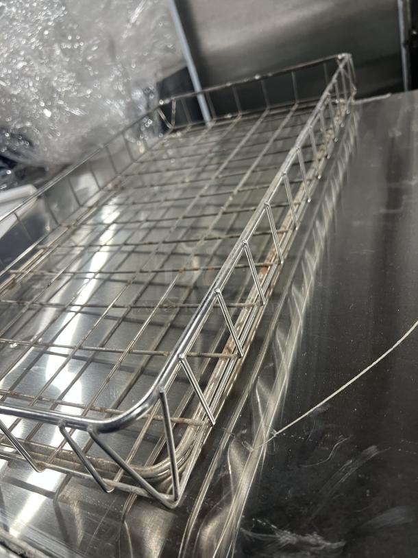 Commercial chrome-plated full-size wire rack for bagels/pastries. Excellent condition, sturdy, sleek design.