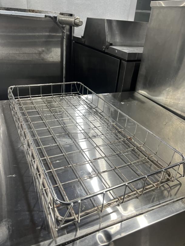 Commercial chrome-plated full-size bagel/pastry wired rack, sturdy metal construction, excellent condition.