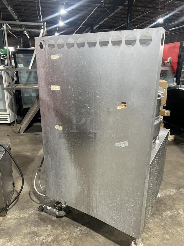 Cleveland Range stainless steel tilting kettles, Model 36GMK1010300, 10-gallon, with modular generator base, on legs.