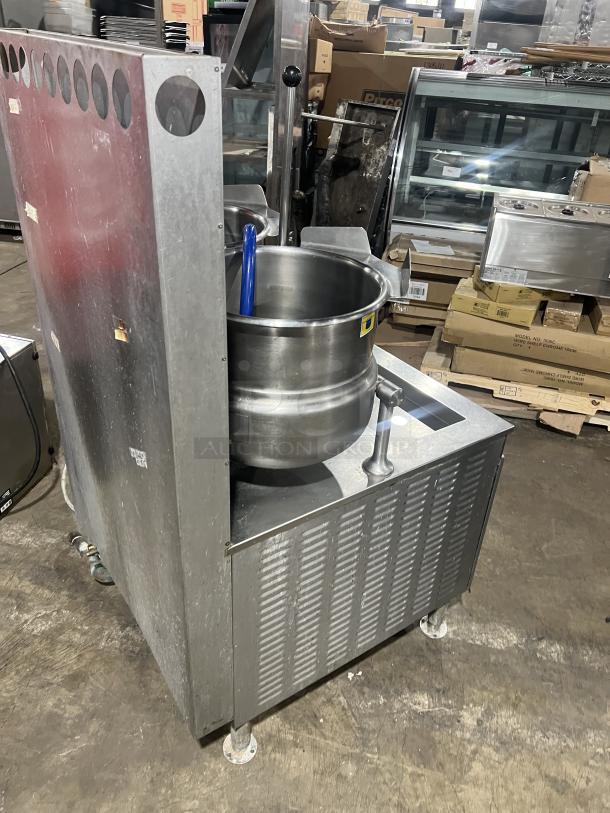 Cleveland Range stainless steel tilting kettles, model 36GMK1010300, with modular generator base, on legs.