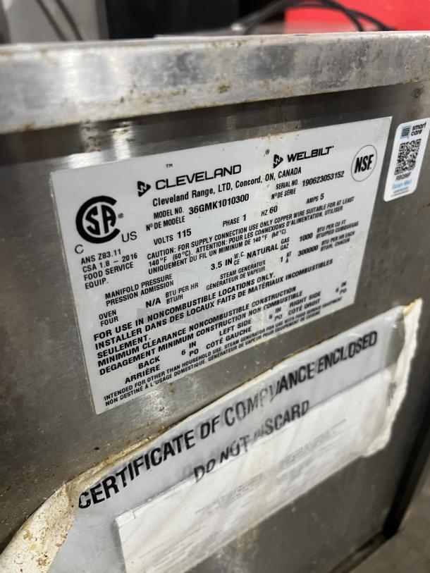 Cleveland Range Model 36GMK1010300, commercial stainless steel steam jacketed kettles, 10-gallon capacity, modular generator base, visible labels.